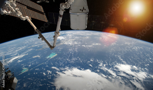 Fototapeta Naklejka Na Ścianę i Meble -  View of planet Earth from a space station window during a sunrise 3D rendering elements of this image furnished by NASA