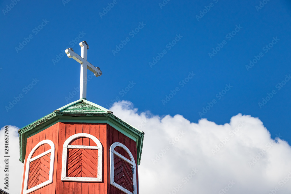 The hexagonal roof with a cross of the Frelserens Kirke also know as Church of Our Saviour. Qaqortoq - Julianehab, Greenland The hexagonal roof with a cross of the Frelserens Kirke also know as Church of Our Saviour. Qaqortoq - Julianehab, Greenland