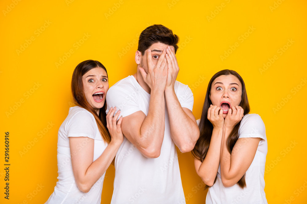 Portrait of three nice attractive nervous devastated frustrated person expressing fear sorrow disgust crying hiding shouting isolated over bright vivid shine yellow background Portrait of three nice attractive nervous devastated frustrated person expressing fear sorrow disgust crying hiding shouting isolated over bright vivid shine yellow background