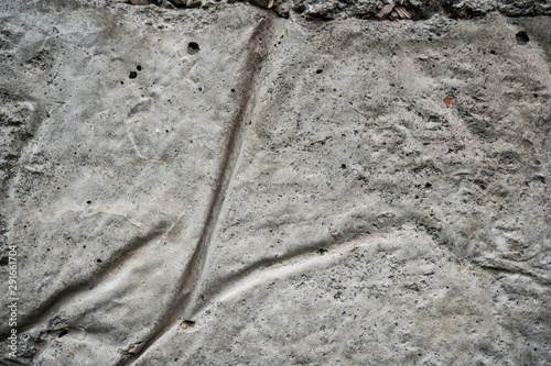 Texture of uneven old concrete slab. Background image macro photo of concrete