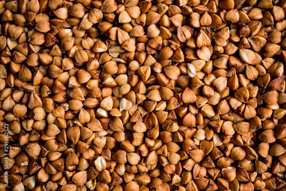 The texture of dry buckwheat. Background image of buckwheat porridge. Maro's Photo The texture of dry buckwheat. Background image of buckwheat porridge. Maro's Photo
