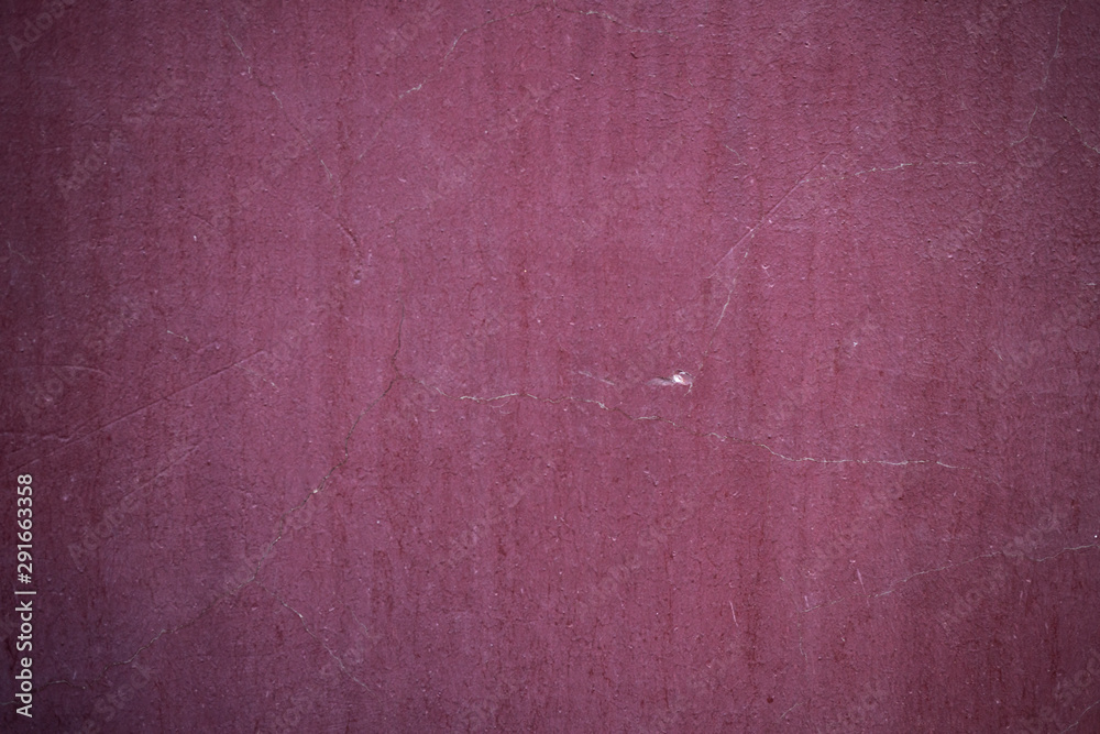 Fototapeta premium Texture of an old wall covered with paint. Background image of a worn paint coated surface