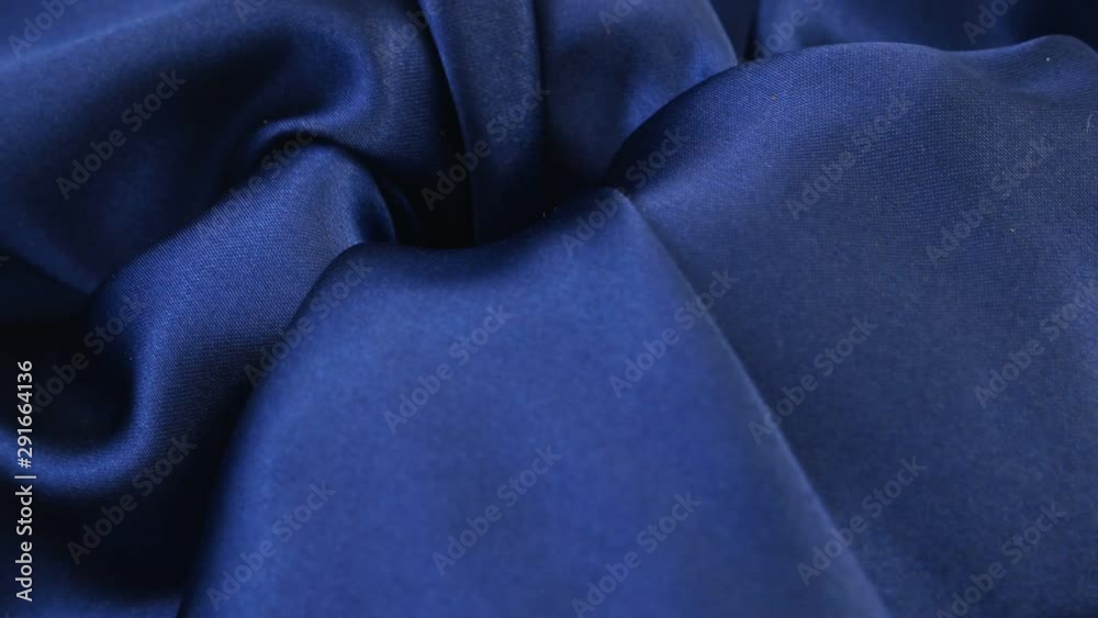 Dark blue satin, midnight blue color, drapery, background Dark blue satin, midnight blue color, drapery, background