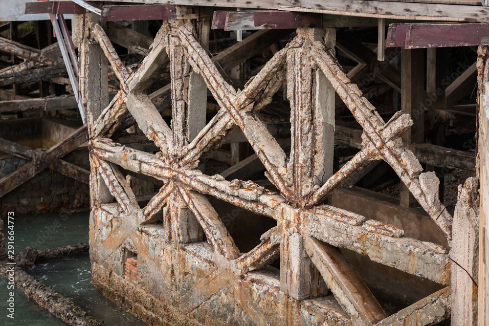 Reinforced concrete have cracked and rusty in steel structure in caused by salt in the sea Reinforced concrete have cracked and rusty in steel structure in caused by salt in the sea