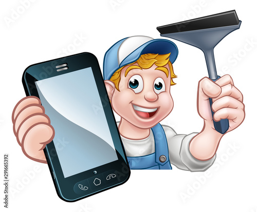 A window cleaner holding a ...