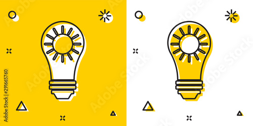 Black Solar energy panel icon isolated on yellow and white background. Sun and light bulb. Random dynamic shapes. Vector Illustration