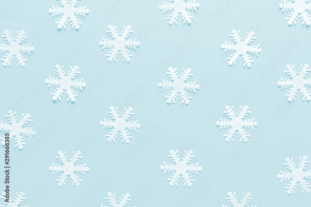 Christmas, New Year or Noel holiday festive winter greeting card with decorations, snowflakes on blue background, flat lay composition, top view Christmas, New Year or Noel holiday festive winter greeting card with decorations, snowflakes on blue background, flat lay composition, top view