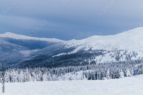 Winter snow covered mountain peaks in Europe. Great place for winter sports © Bohdan Melnyk
