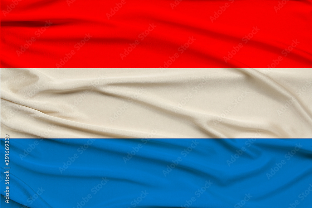 beautiful photo of the Luxembourg national flag on delicate shiny silk with soft draperies, the concept of state power, country life, horizontal, close-up, copy space beautiful photo of the Luxembourg national flag on delicate shiny silk with soft draperies, the concept of state power, country life, horizontal, close-up, copy space