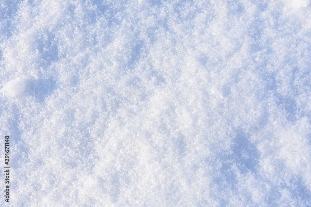 Texture of the white fluffy snow for background