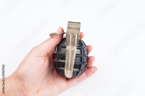 Bomb in hand isolated on white background.Copy space