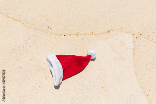 Christmas hat on tropical beach