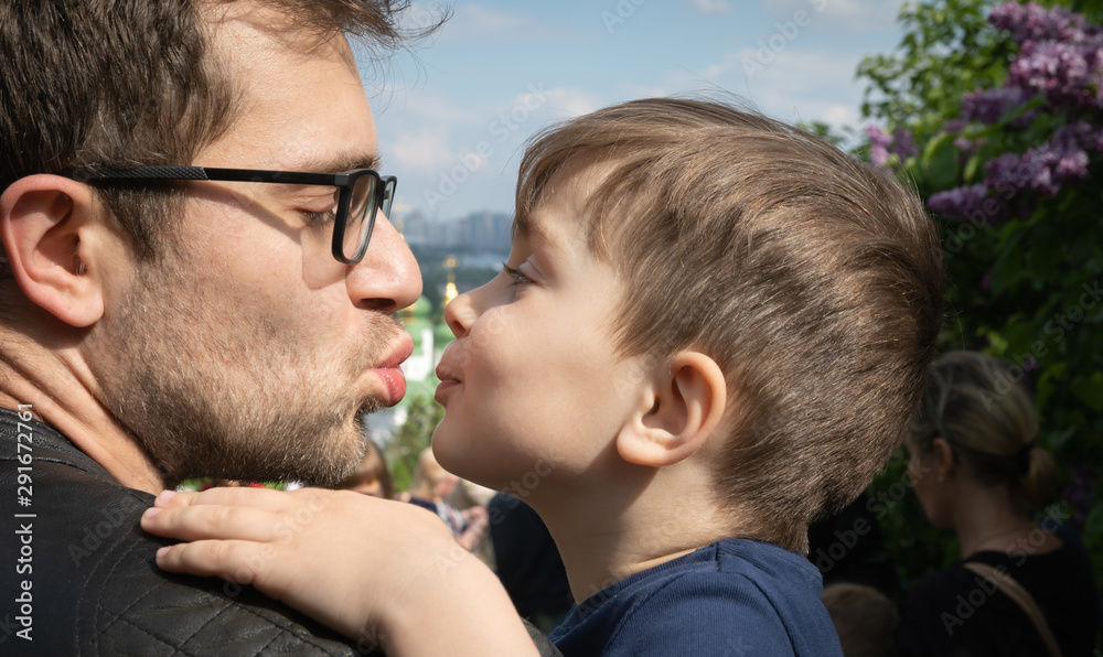 ather kisses his little son ather kisses his little son