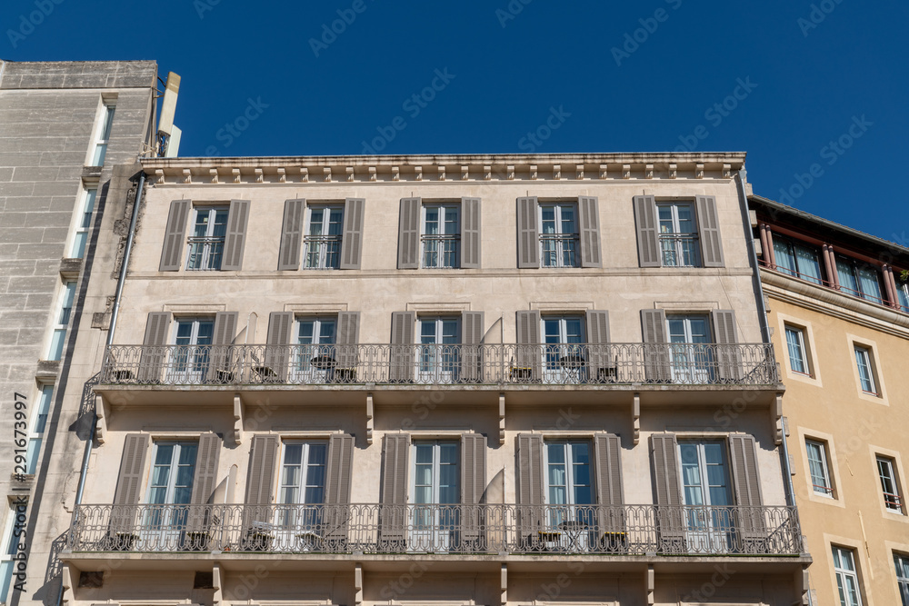 large ancient building facade typical of Avignon city center