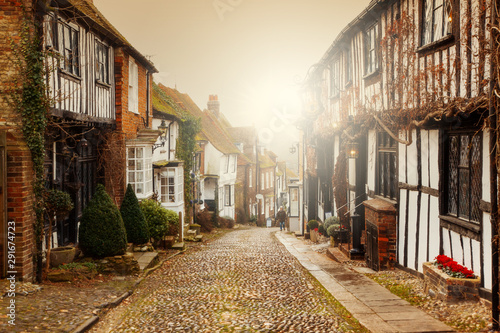 pretty Tudor half timber houses on a cobblestone street at Rye in West Sussex photo