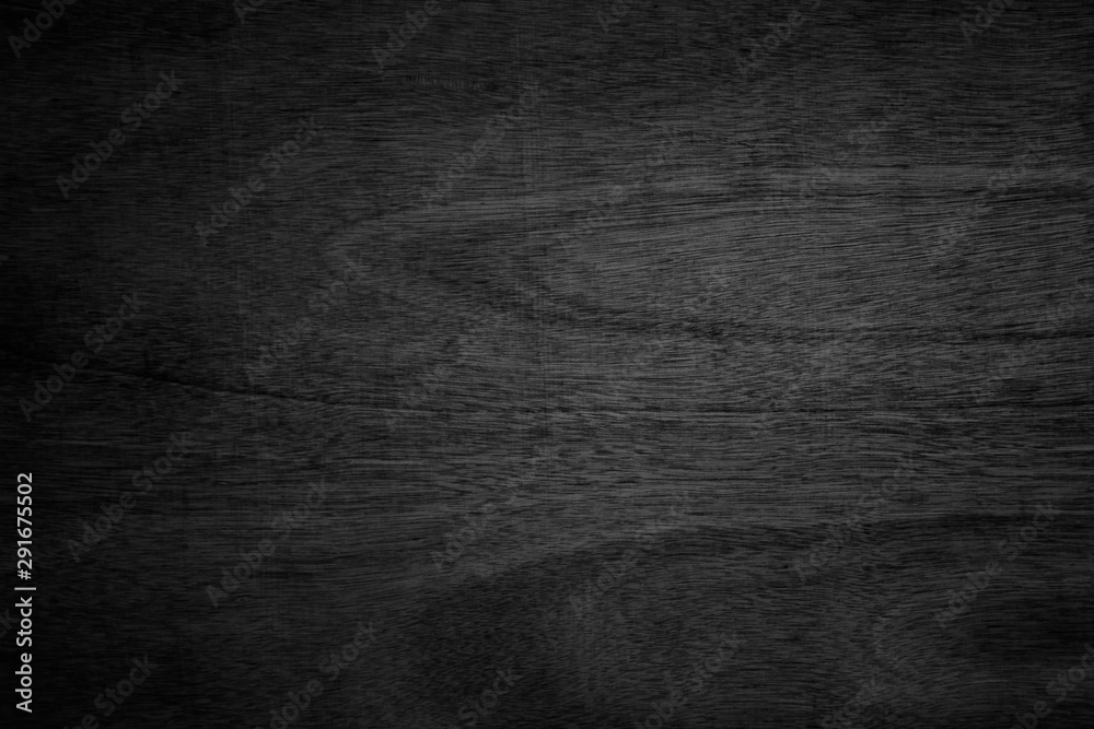 Abstract vignette black wood texture high quality close up. Dark furniture plank material wallpaper. Blank grunge wooden grain surface be used design as background or board luxury floor. Abstract vignette black wood texture high quality close up. Dark furniture plank material wallpaper. Blank grunge wooden grain surface be used design as background or board luxury floor.