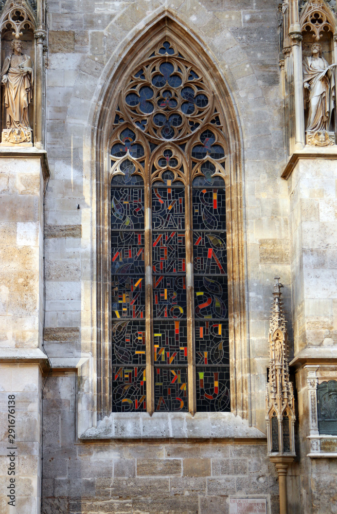 Saint Stephens Cathedral window with stained glass Vienna Austria