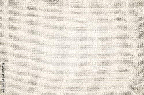 Cream pastel texture background. Haircloth or blanket wale linen canvas wallpaper. Rustic canvas fabric texture in natural color. Natural vintage linen burlap fabric texture background.
