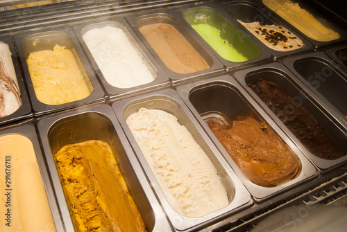 A refrigerated display case with ice creams