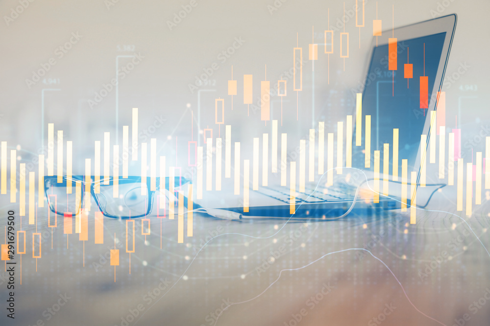 Forex Chart hologram on table with computer background. Multi exposure. Concept of financial markets. Forex Chart hologram on table with computer background. Multi exposure. Concept of financial markets.