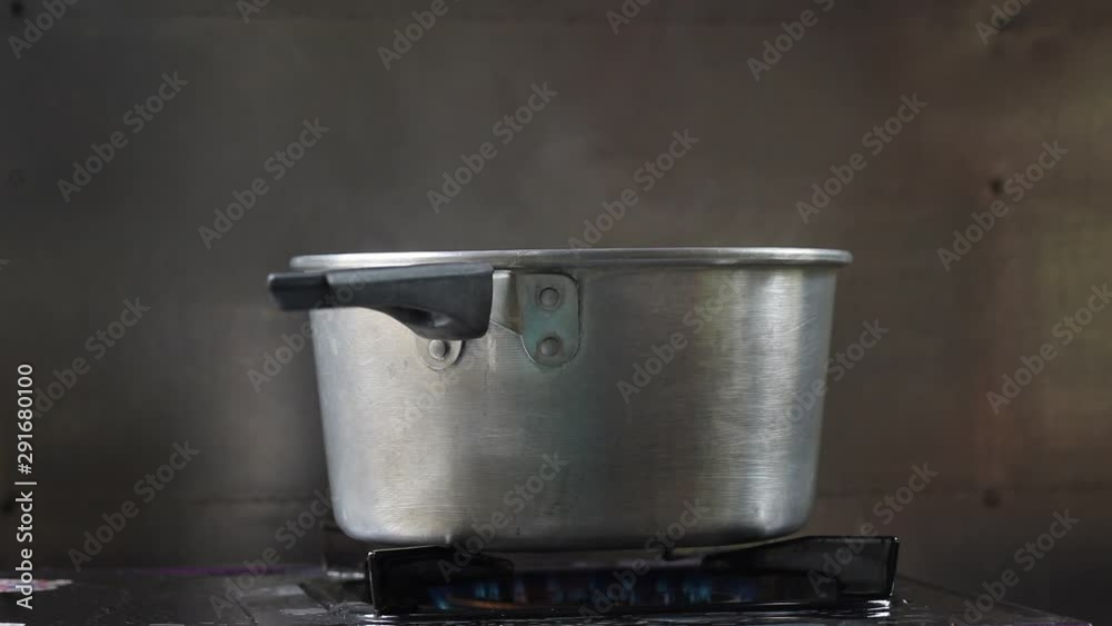 hot pot boil water vapour steam on gas stove