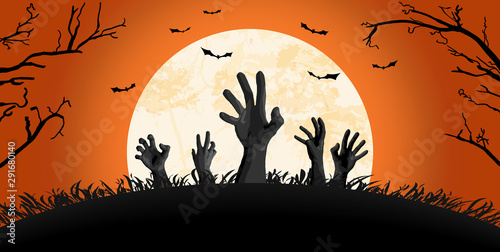 Halloween zombie hand in front of full moon