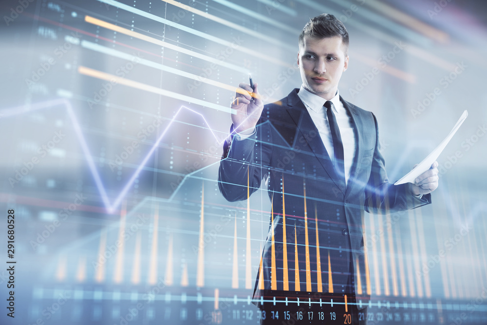 Businessman and forex graph hologram. Double exposure. Concept of financial education and analysis Businessman and forex graph hologram. Double exposure. Concept of financial education and analysis