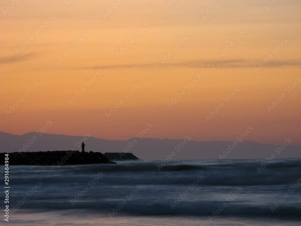  Sunset sky abstract background. Yellow sunset sky over the sea. Golden time of sky at sunset - sunrise time in summer season. Warm color sky  yellow. White space for text.