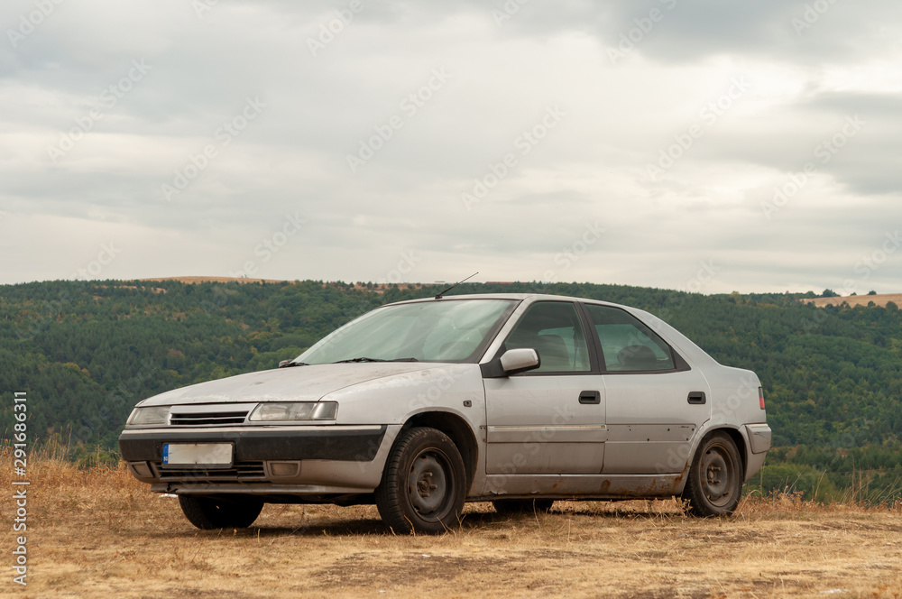 car against mountains. Closeup photo of offroad wheel car against mountains. Closeup photo of offroad wheel