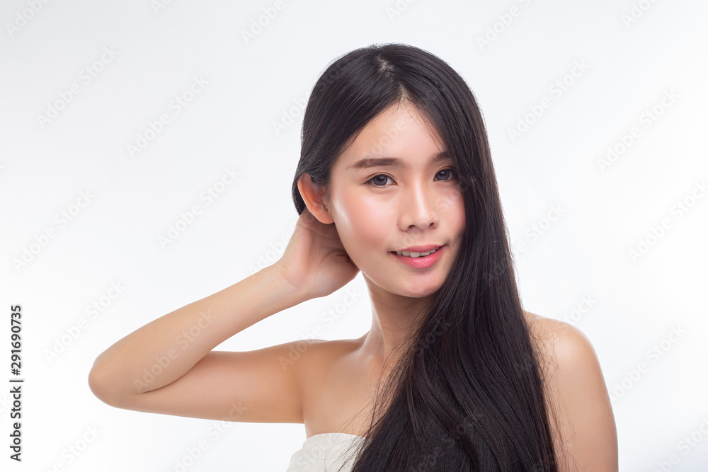 The woman wearing white strapless tops and hands touch her hair. The woman wearing white strapless tops and hands touch her hair.