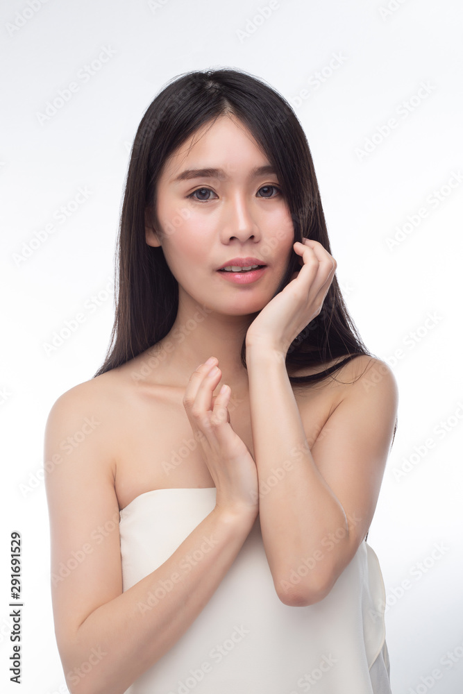 The woman wearing white strapless tops and hands touch her hair. The woman wearing white strapless tops and hands touch her hair.