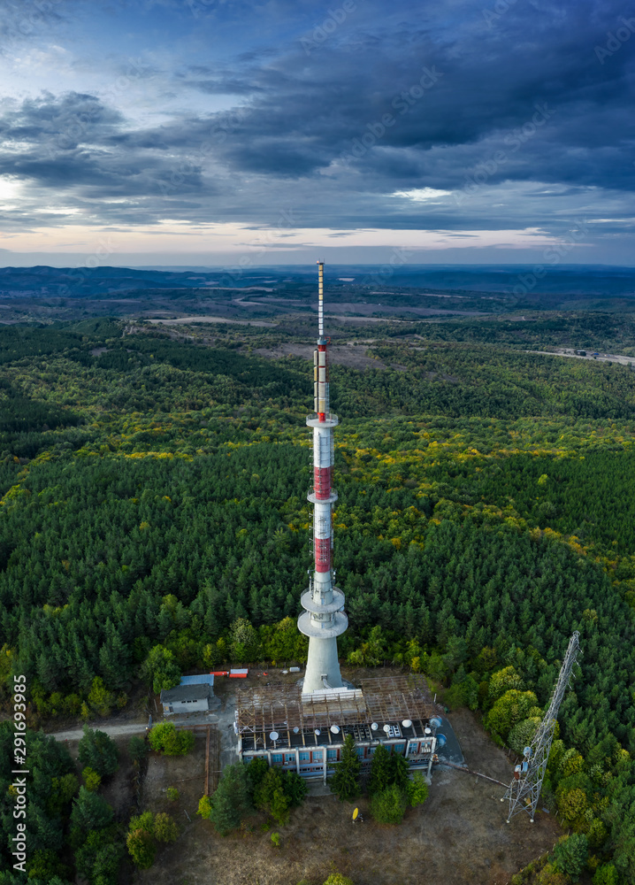 Obraz premium Tv tower on the hill at sunset