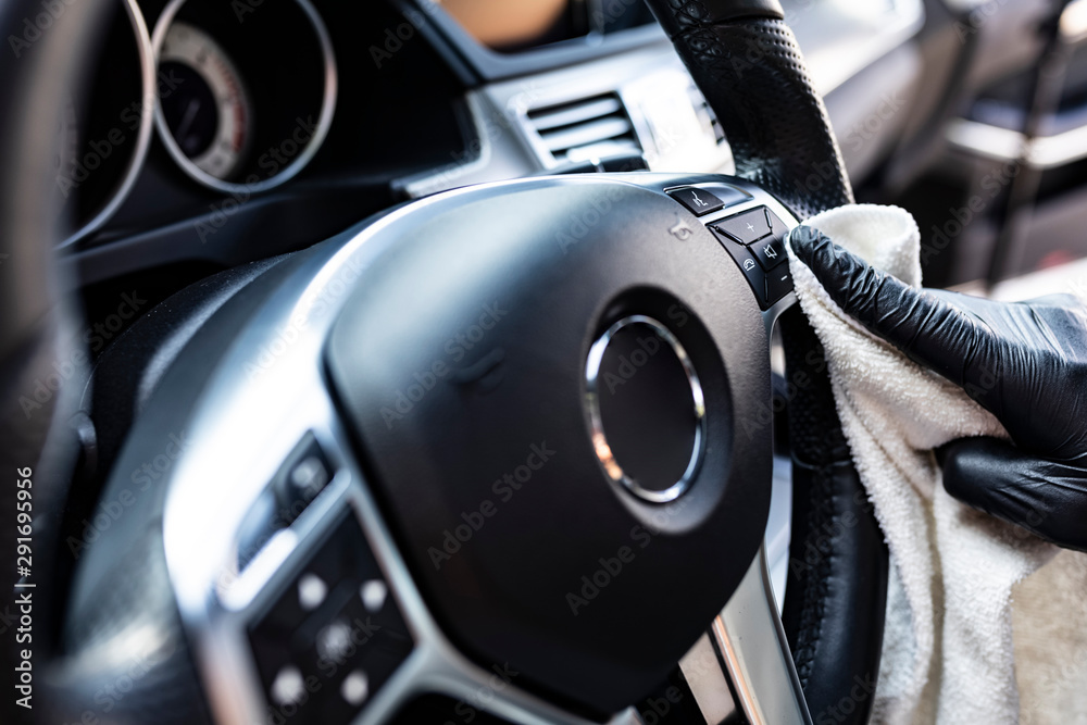 Car detailing. Cleaning the car steering wheel. Car detailing. Cleaning the car steering wheel.