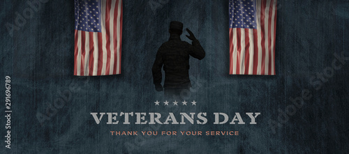American National Holiday. US Flag background with American stars, stripes and national colors. Soldiers. Text: VETERANS DAY - Thank you for your service