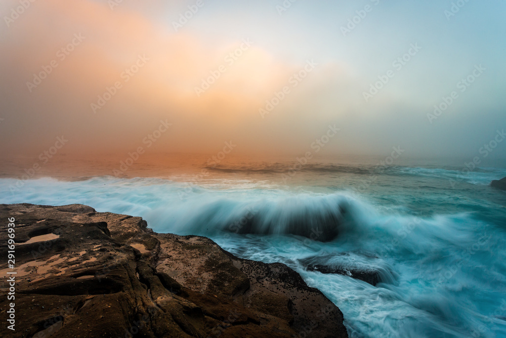 Foggy sunrise Sydney coast seascape