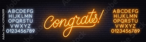 Neon sign congrats a dark background. Template for design with font.