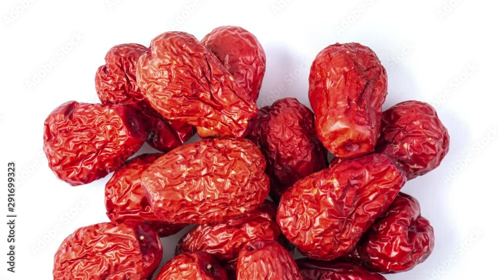 panning Jujube Chinese dried red date fruit on white background. top view panning Jujube Chinese dried red date fruit on white background. top view