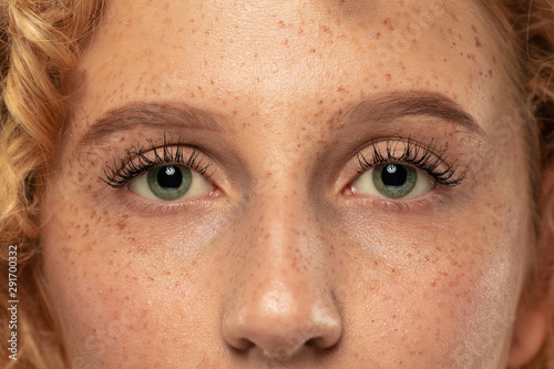 Photos Beautiful young woman's eyes close-up shot