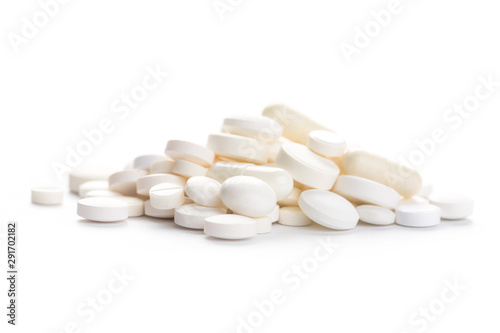 Medical,pharmacy theme background concept. White pills on white background.