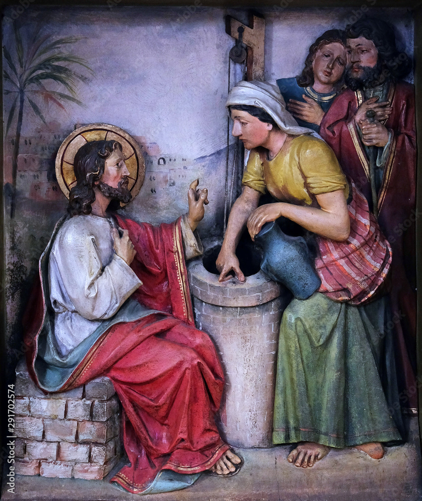 Fototapeta premium Jesus and the Samaritan Woman, relief in the church of Saint Martin in Zagreb, Croatia