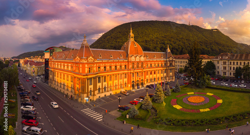 City Prefecture, panoramic and aerial view over medieval architecture of Brasov town from Transylvania, Romania