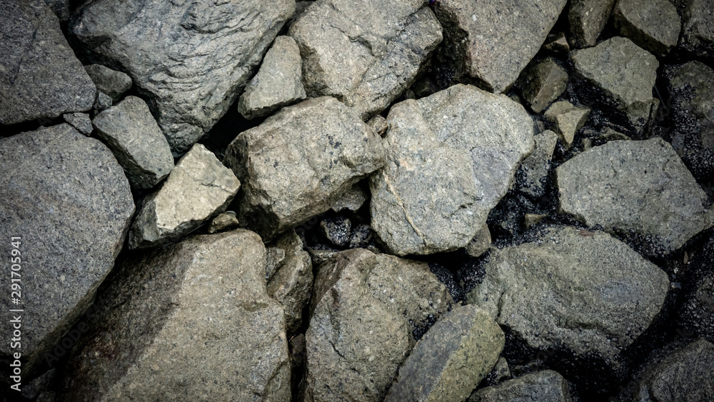 Hard and rough rocks background and texture at the beach. Hard and rough rocks background and texture at the beach.