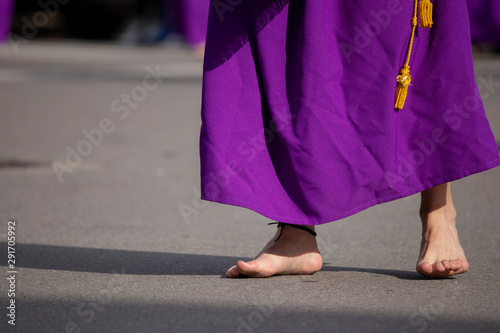 Barefoot man in a procession, Holy Week