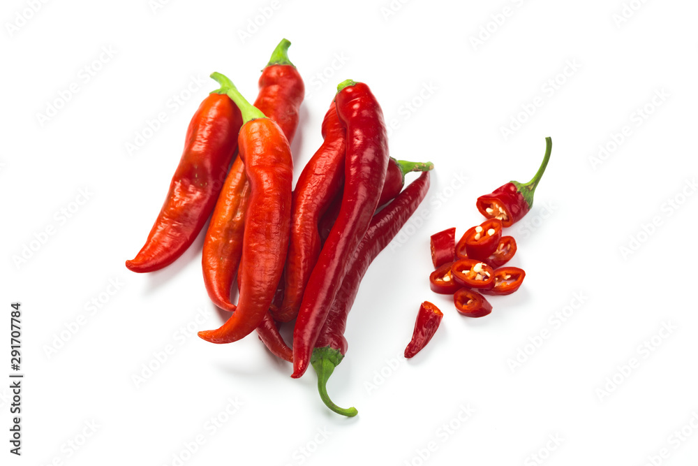 Closeup top view red chili pepper with sliced on white background, raw food ingredient concept Closeup top view red chili pepper with sliced on white background, raw food ingredient concept
