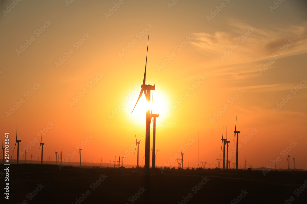 Obraz premium Wind turbines in the evening