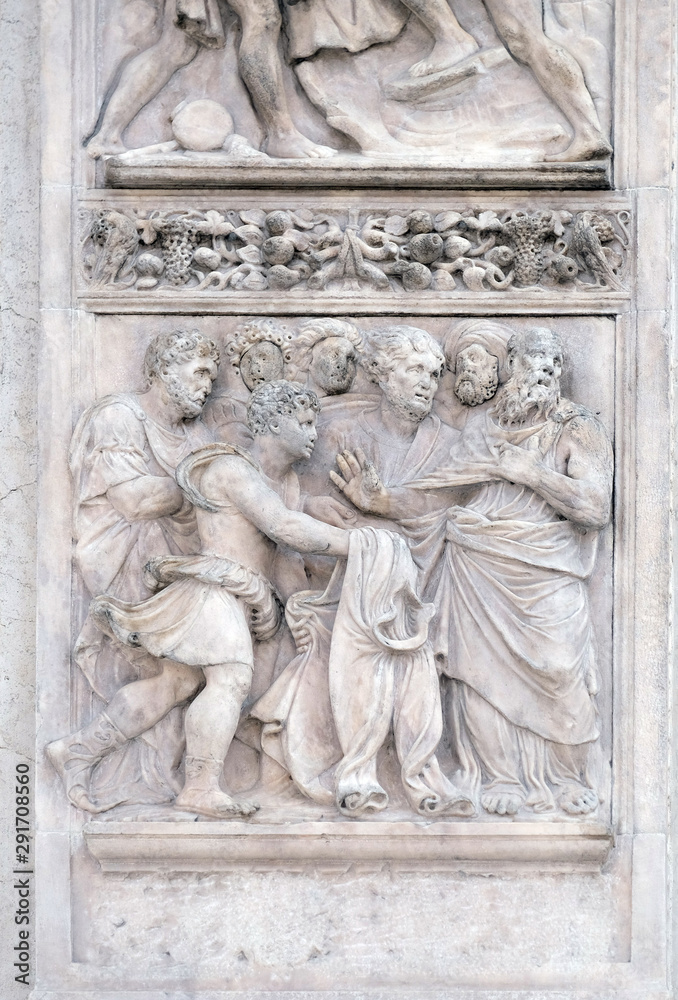 BOLOGNA, ITALY - JUNE 04: The brothers show Joseph's clothes to Jacob, panel by Girolamo da Trevisio on the right door of San Petronio Basilica in Bologna, Italy, on June 04, 2015