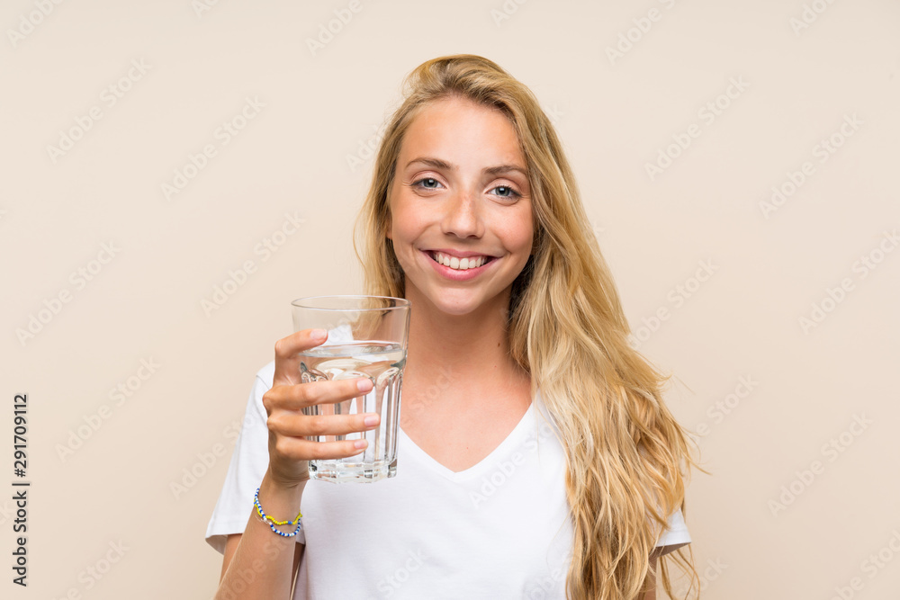 Happy Young blonde woman with a glass of water Happy Young blonde woman with a glass of water