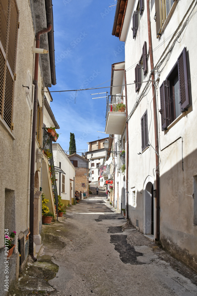A road between the houses of an Italian mountain village