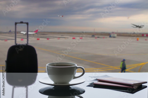 a cup of coffee at the airport