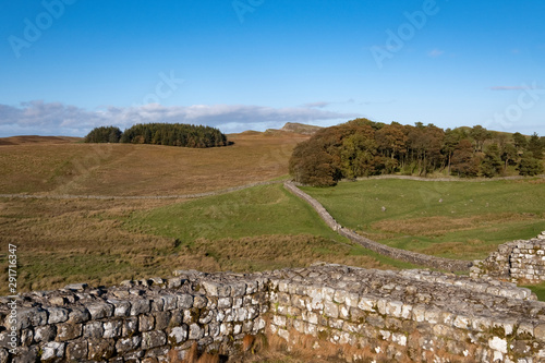 Hadrians Wall at Housesteads, Hexham, Northumberland, UK - the remails of the old wall built by the romans photo